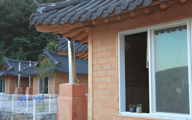 Sanasa Red Clay House