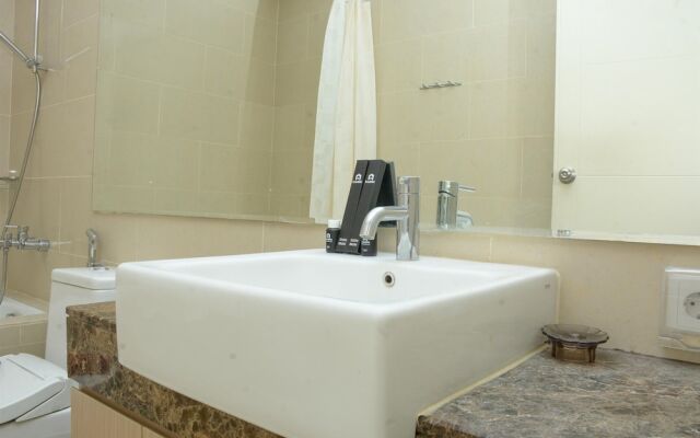 Homey And Cozy Stay 2Br At Casa Grande Apartment