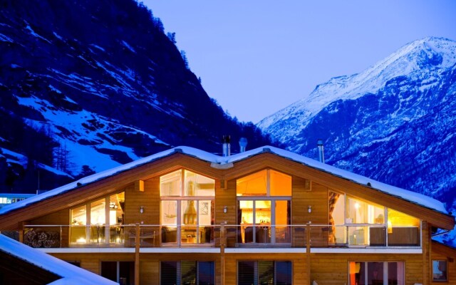 Mountain Exposure Luxury Chalets & Penthouses & Apartments