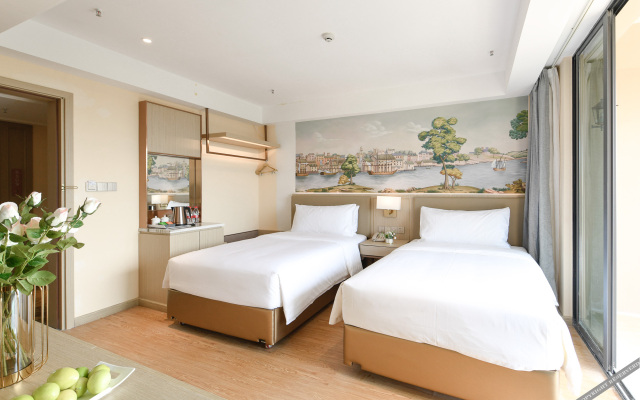 Vienna Hotel (Beihai Weizhou Island Lanqiao seaview shop)