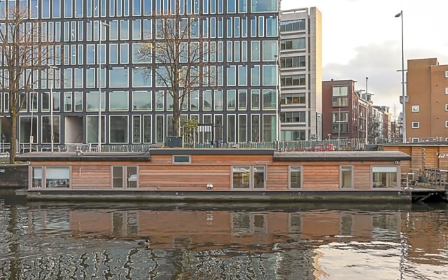 HouseBoat next to AMSTEL