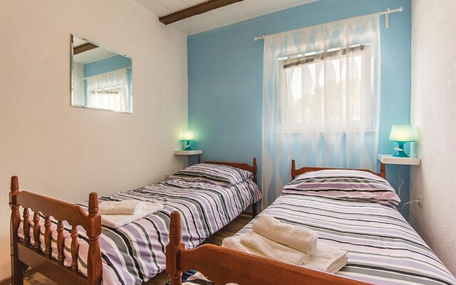 Awesome Home in Peroj With Wifi and 2 Bedrooms