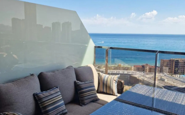 SUNSET WAVES vistas al mar