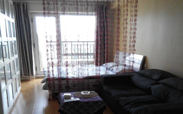 Dalian Hehe Apartment Hotel
