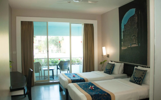 Whispering Palms Beach Resort