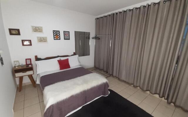 Suite climatizada, ao lado da praca principal