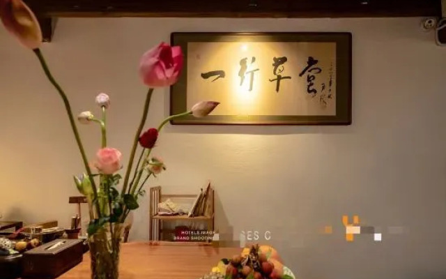 Yixing Thatched Cottage Inn (Lijiang Old Town Dashuiche Branch)