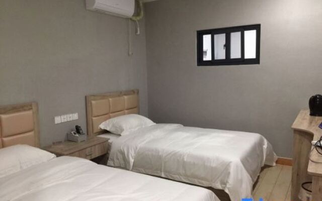 Pinghu liduo sheng business hotel