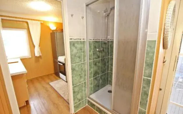 Ferienhaus mit Ruderboot Kummerow