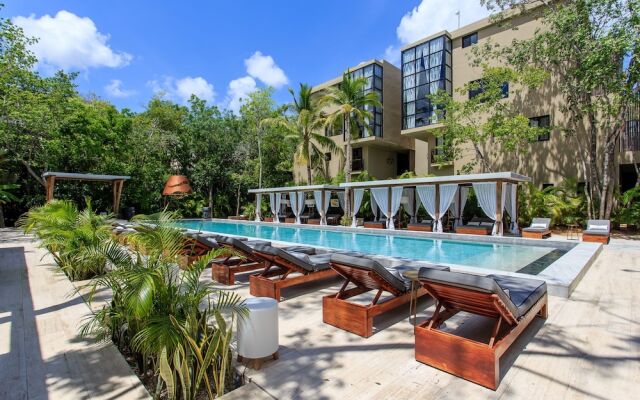Where Art & Jungle Meet Luxury in Tulum by Stella Rentals