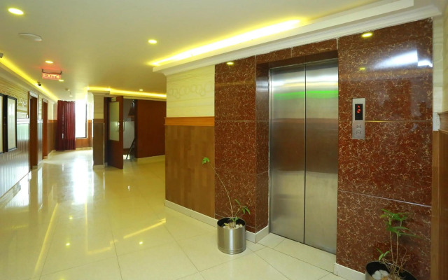 Capital O 14702 Kovilakam Residency