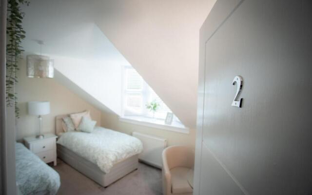 3 Private bedrooms attached to hosts home Free parking