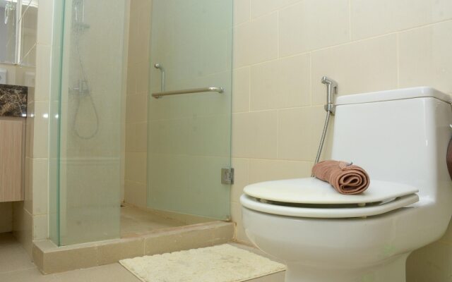 Homey And Cozy Stay 2Br At Casa Grande Apartment