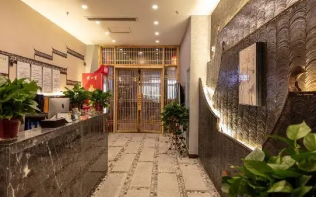 Mohist Impression Hotel (Xinxiang Baolong Plaza)