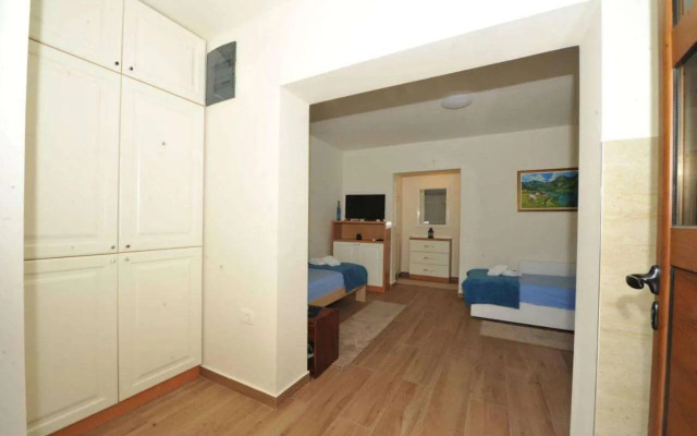 Three-Bedroom Holiday Home in Dobrota