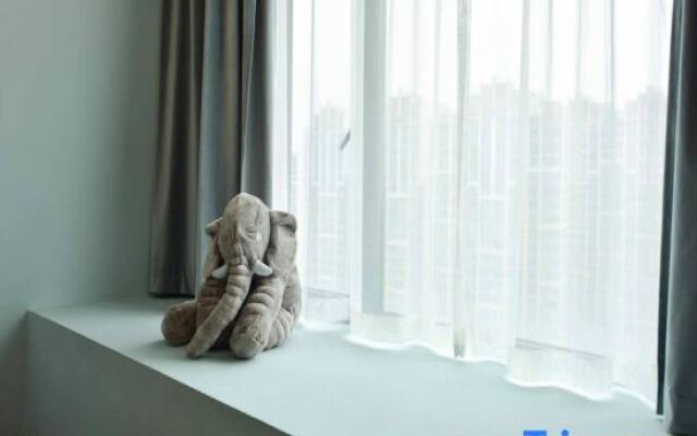 Quzhu City Homestay (Shiyan Wanda Plaza Branch)