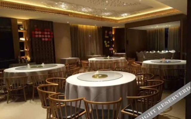 New Beacon Yunman Internation Hotel (Yingshan Tourist Center Chaxiang Small Town)