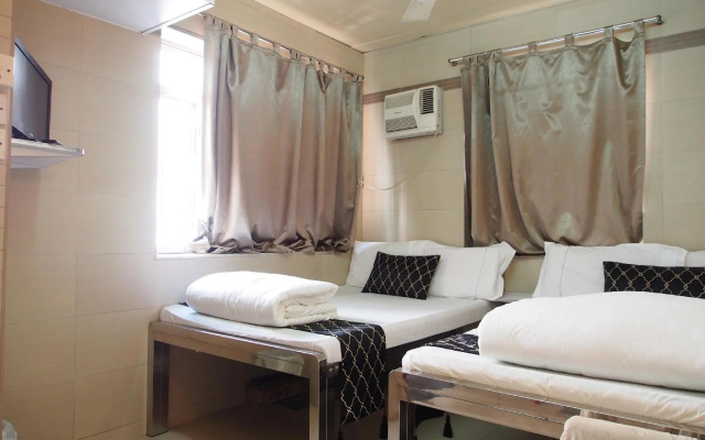 New Grand Guest House – Guest Rooms – Kowloon