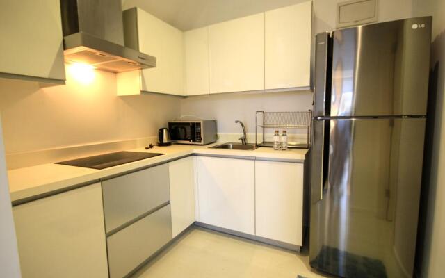 SIGLO SUITES @ The Gramercy Residences