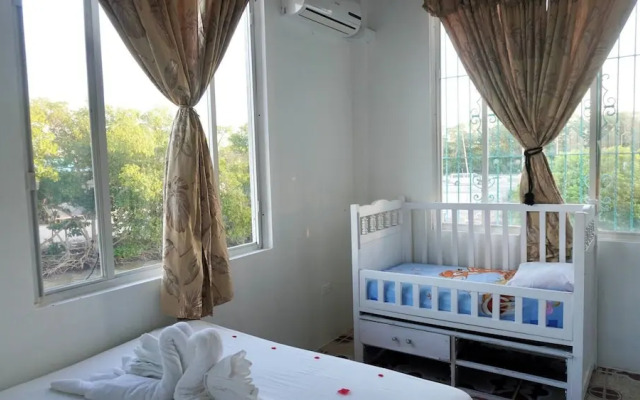 See Belize Waterside Sea View 2-bedroom Apartment w Balcony, Pool & Deck 2nd FL