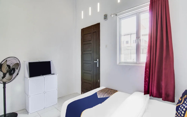 SPOT ON 91858 Raja Homestay Syariah