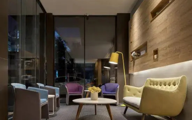 Orange Boutique Hotel Xinyang