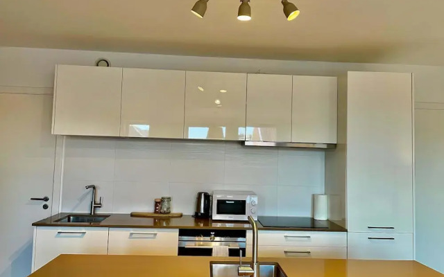 Modern 2BR 1.5 BA Near Diamond District by Oneluxstay