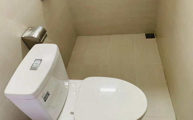 Oyo 877 Win Hotel And Apartment