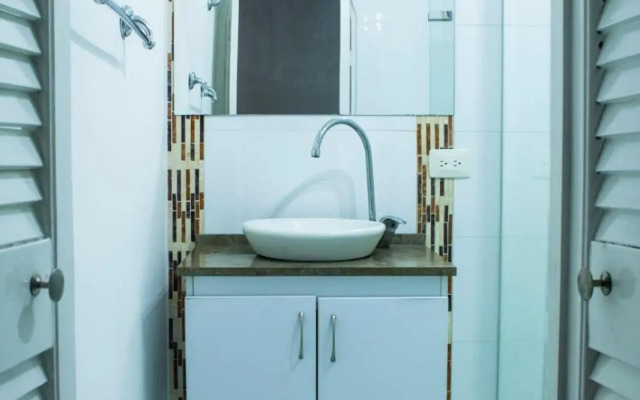 Apartamento con playa privada y piscina