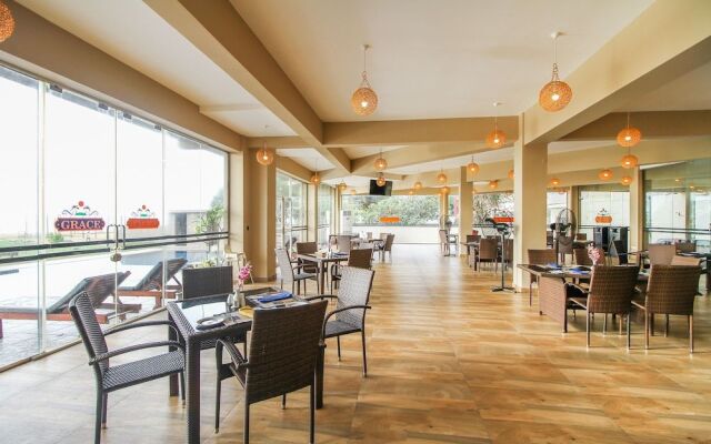 Capital O 311 Grace Beach Resort