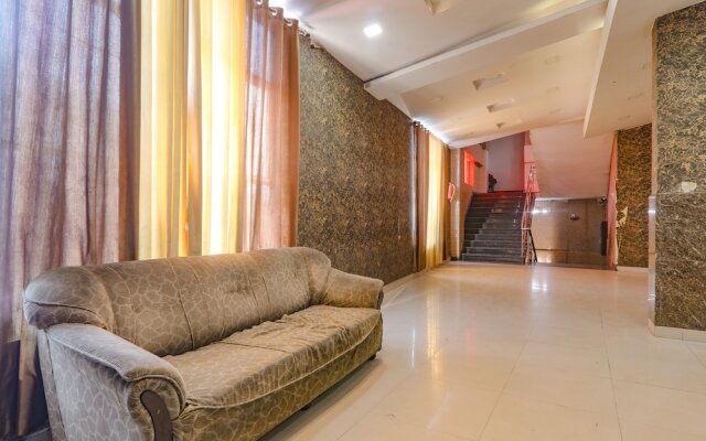 Fabhotel Gold Galaxy