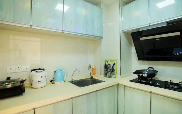 Xin Wo Hotel Apartment Railway Station