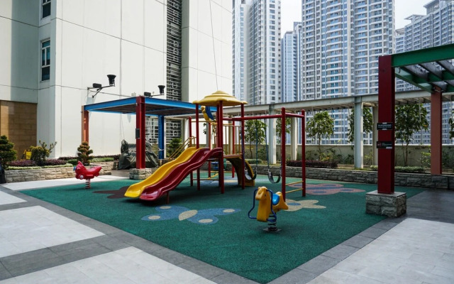 Modern 1BR Apartment at Central Park Residence By Travelio