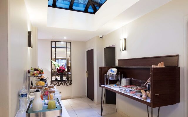 Hôtel Paris Louvre Opéra