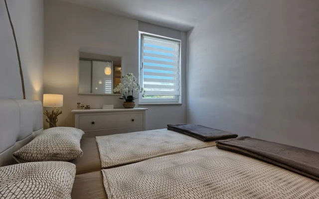 Seaside Apartment with Pool