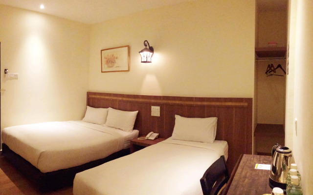 Super OYO 596 The Vintage Hotel