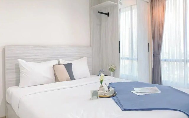 Simple White Designed Studio At Lrt City Bekasi Apartment