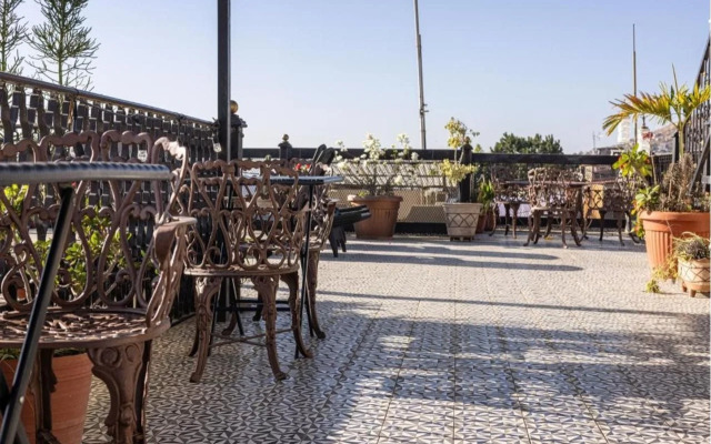 Capital O Hotel Patio Pombo