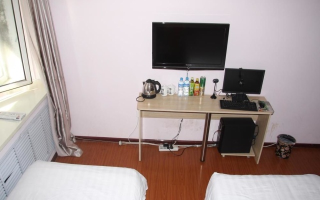 Jinbaoli Business Hotel – Guest Rooms – Harbin