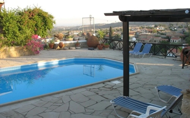 Adamos House