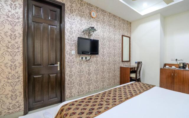 Cosy Grand @Chanakyapuri by The Cosy Hotels.