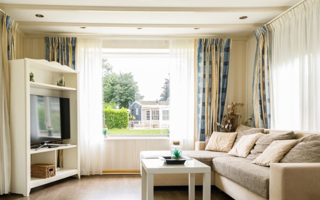 Romantic Chalet in Lathum Near a Beautiful Sandy Beach