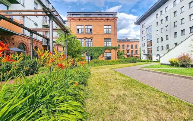 Dwupoziomowy loft w Tobaco Park