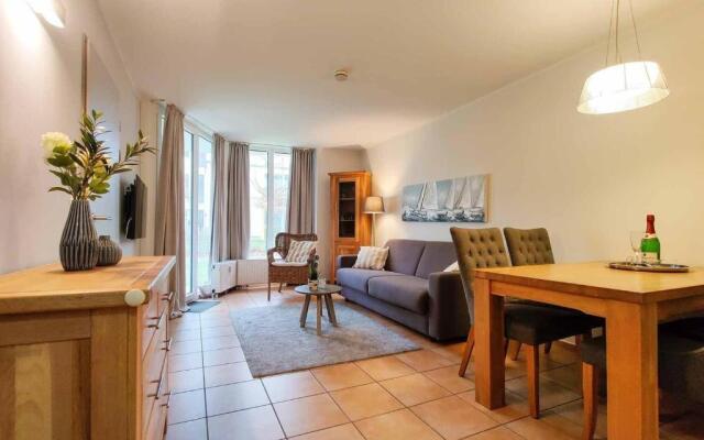 Ferienwohnung-11-mit-Terrasse-und-Strandkorb-am-Strand-Haus-Hohe-Worth-Duhnen