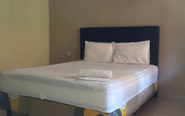 The Harvest Family Homestay RedPartner – Guest Rooms – Tamansari