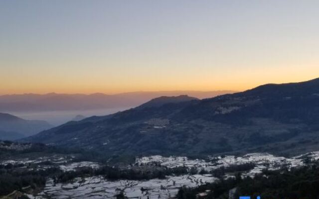 Xinlv Time Inn (Yuanyang Terraced Field Scenic Area)