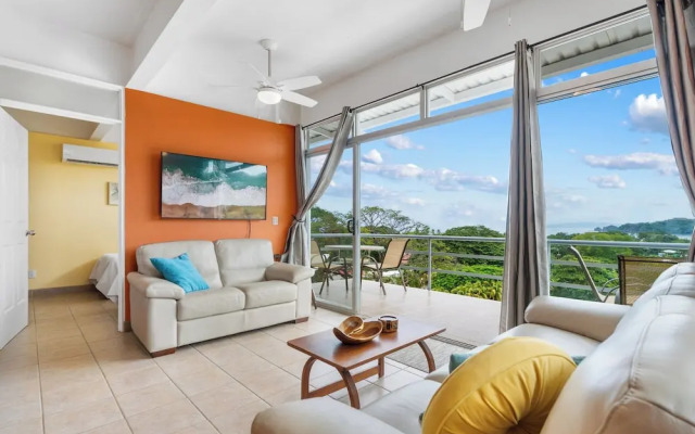 Modern Top-Floor Condo with Panoramic Views and Community Pool