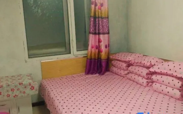 Xuexiang Jinlong Family Hotel