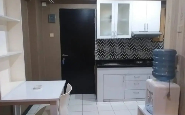 THE ROOMOS Hotel Apartemen