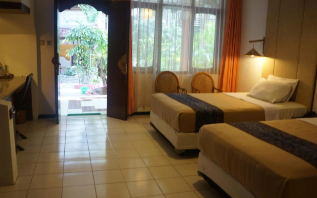 Puri Naga Beachfront Cottages